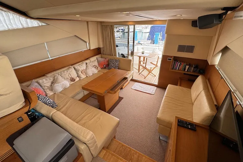 My Law Yacht Photos Pics Luxurious 2007 Fairline Phantom 48 yacht interior with plush seating and elegant decor.