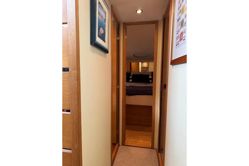My Law Yacht Photos Pics Hallway leading to bedroom in 2007 Fairline Phantom 48 yacht interior.