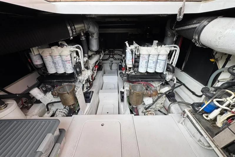 My Law Yacht Photos Pics Engine room of 2007 Fairline Phantom 48 yacht, showcasing dual engines and mechanical components.