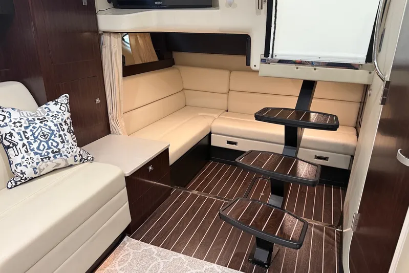 Wanderlust Yacht Photos Pics Luxurious interior of 2015 Monterey 355 Sport Yacht with beige seating and modern design.