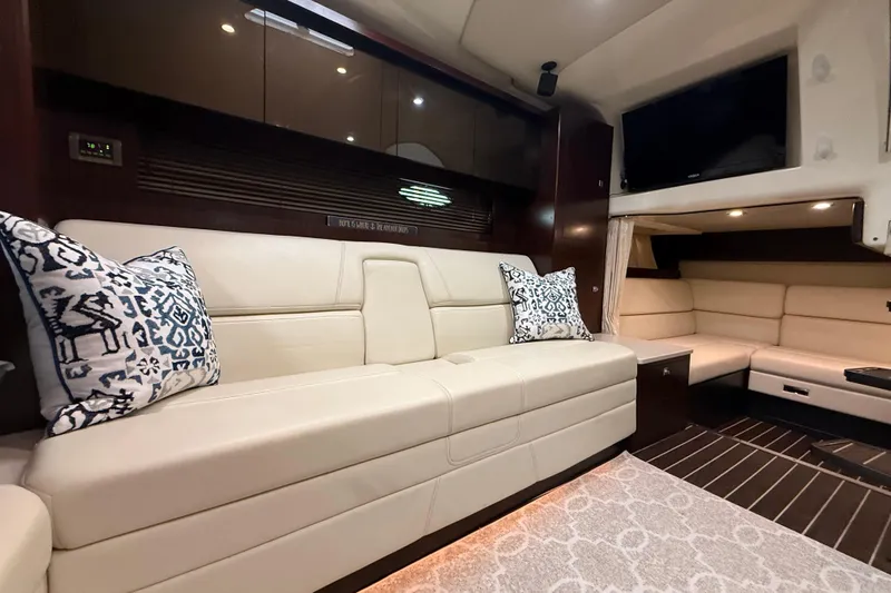 Wanderlust Yacht Photos Pics Luxurious interior of 2015 Monterey 355 Sport Yacht with plush seating and modern decor.