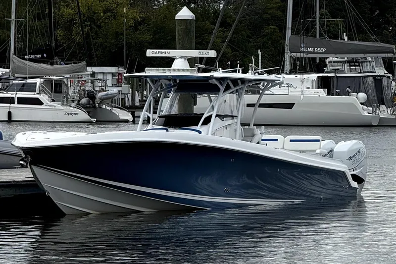  Yacht Photos Pics 2017 Nor-Tech 392 Superfish boat docked in a marina, surrounded by other vessels.
