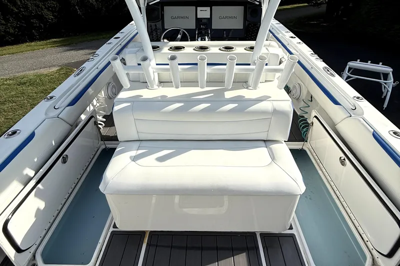  Yacht Photos Pics 2017 Nor-Tech 392 Superfish boat interior with white seating and rod holders.