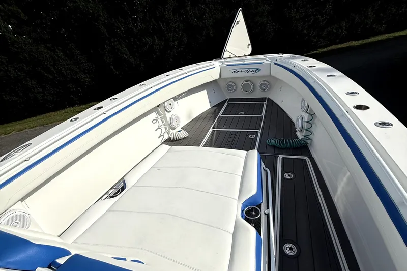  Yacht Photos Pics 2017 Nor-Tech 392 Superfish boat interior with white seating and blue accents.