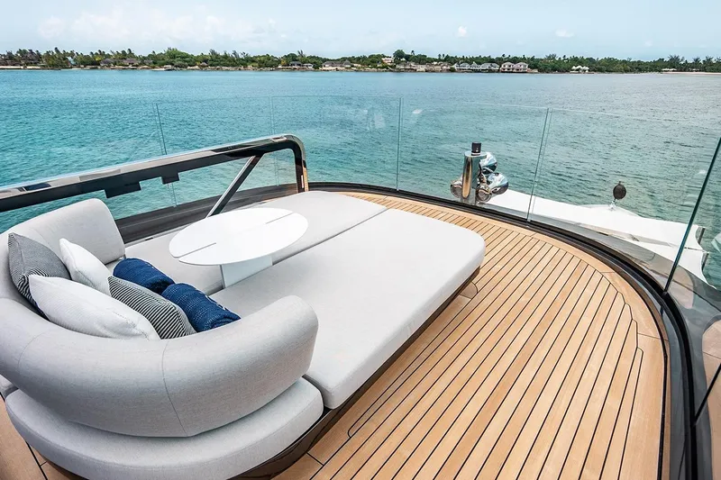 Koju Yacht Photos Pics Luxurious 2022 Benetti Motopanfilo yacht deck with elegant seating and ocean view.