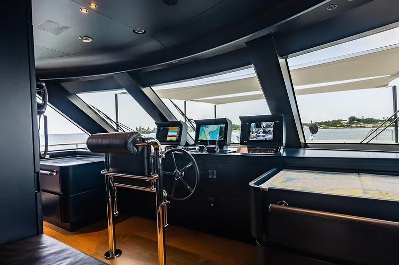 Koju Yacht Photos Pics Bridge of 2022 Benetti Motopanfilo yacht with navigation equipment and sea view.