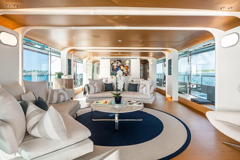 Koju Yacht Photos Pics Luxurious interior of 2022 Benetti Motopanfilo yacht with elegant seating and ocean views.