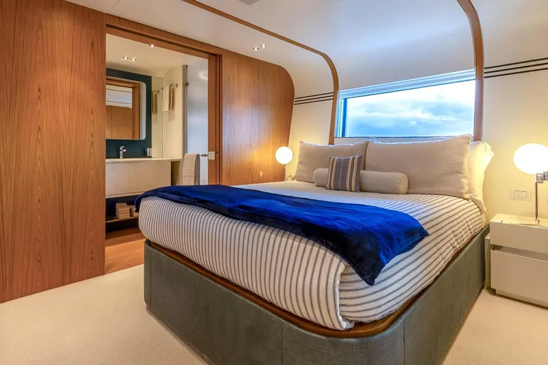 Koju Yacht Photos Pics Luxurious bedroom on 2022 Benetti Motopanfilo yacht with modern design and ocean view.