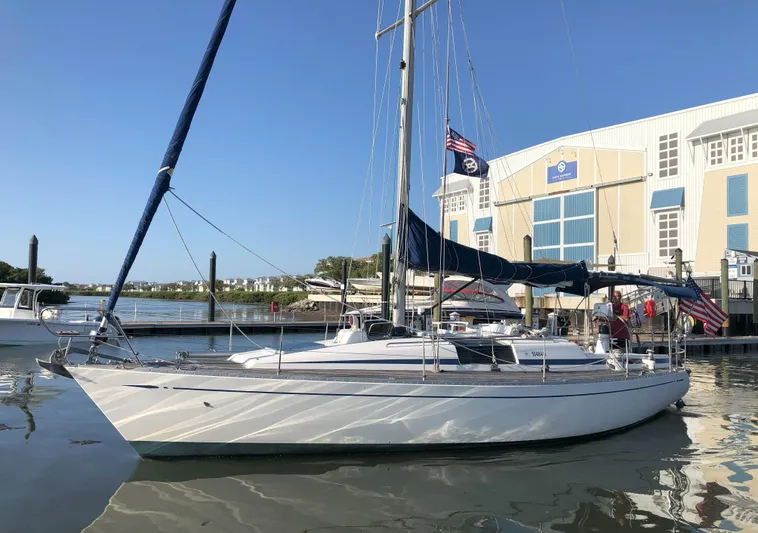Kokomo Yacht Photos Pics 1988 Nautor Swan 36-2 sailboat docked at marina with blue sky background.