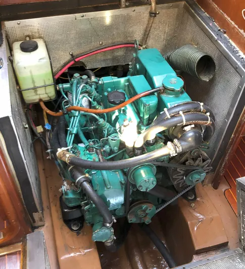 Kokomo Yacht Photos Pics 1988 Nautor Swan 36-2 engine compartment with green marine diesel engine.