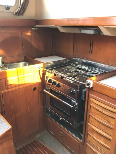 Kokomo Yacht Photos Pics 1988 Nautor Swan 36-2 yacht kitchen with stove, oven, and sink.