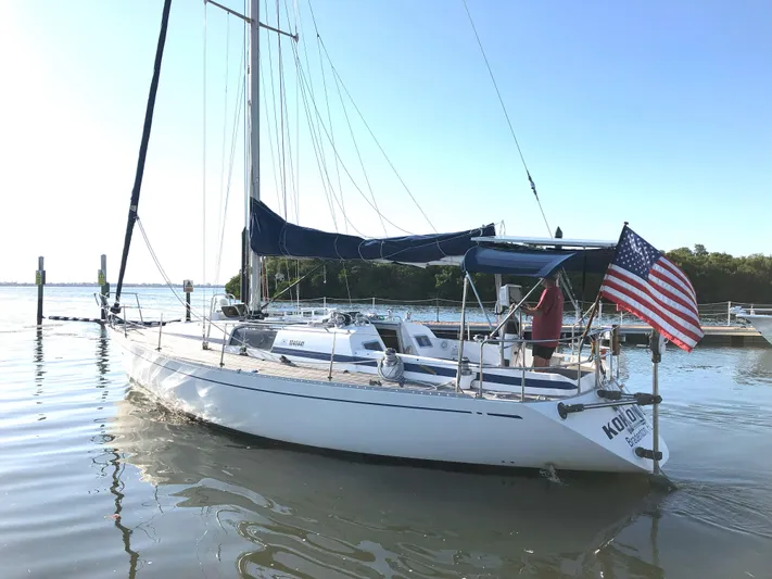 Kokomo Yacht Photos Pics 1988 Nautor Swan 36-2 sailboat docked with American flag.