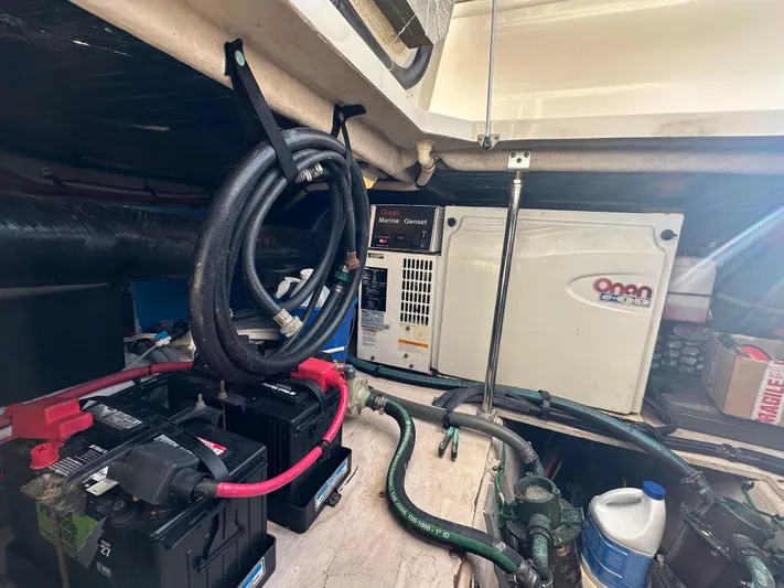  Yacht Photos Pics Engine room of 2005 Sea Ray 420 Sedan Bridge with batteries and Onan generator.