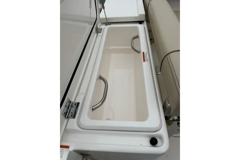  Yacht Photos Pics Open storage compartment on 2018 Pursuit OS 325 Offshore boat.