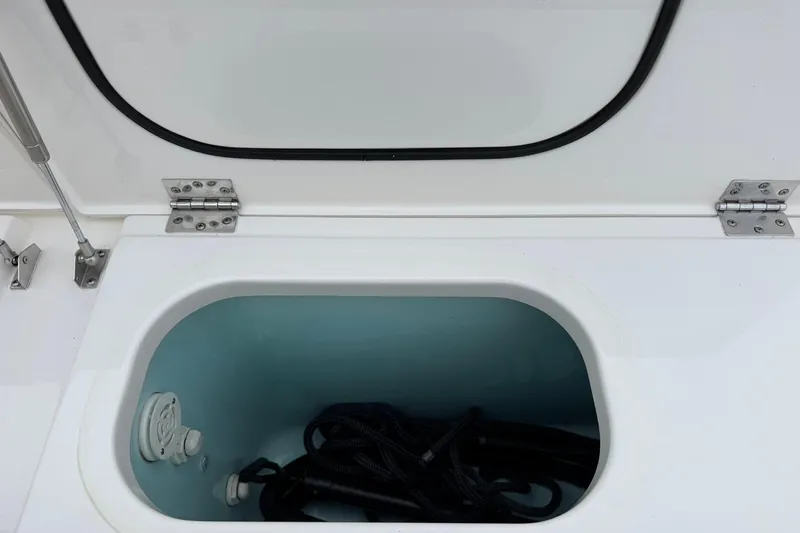  Yacht Photos Pics Open storage compartment on a 2018 Pursuit OS 325 Offshore boat.