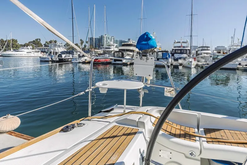 Sabbatical Yacht Photos Pics Beneteau First 44.7 sailboat docked in a marina, 2005 model, sunny day.