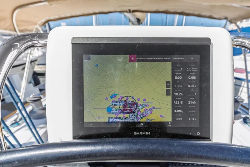 Sabbatical Yacht Photos Pics Garmin navigation display on 2005 Beneteau First 44.7 sailboat, showing nautical map and data.