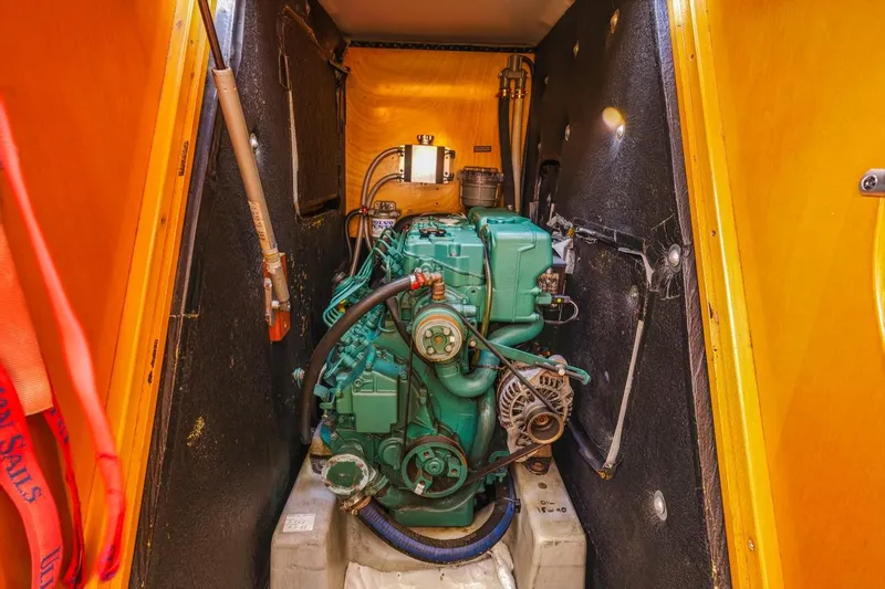 Sabbatical Yacht Photos Pics Engine compartment of 2005 Beneteau First 44.7 sailboat, featuring a Volvo Penta engine.