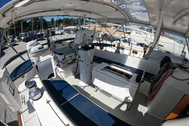  Yacht Photos Pics Cockpit view of 2005 Catalina Morgan 440 sailboat with blue seating and equipment.