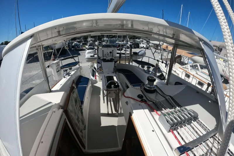  Yacht Photos Pics 2005 Catalina Morgan 440 sailboat cockpit with ropes and winches, docked in a marina.