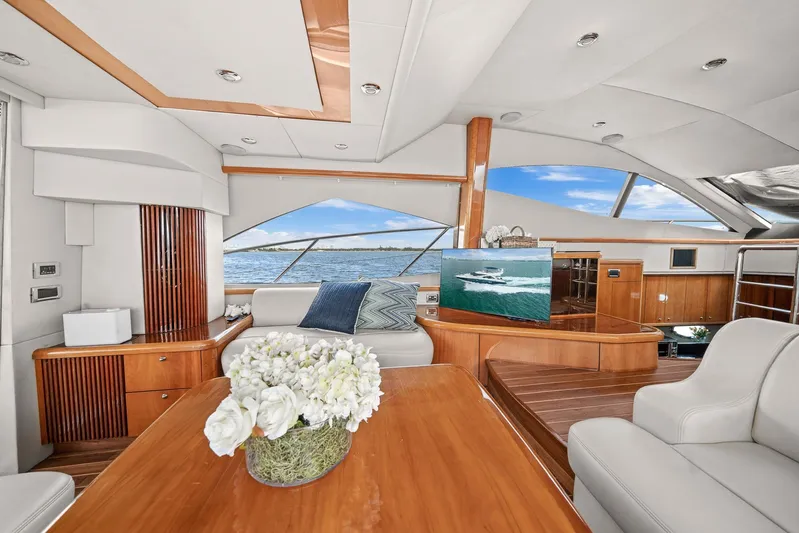  Yacht Photos Pics Luxurious interior of 2006 Sunseeker Manhattan 50 yacht with elegant wood finishes.