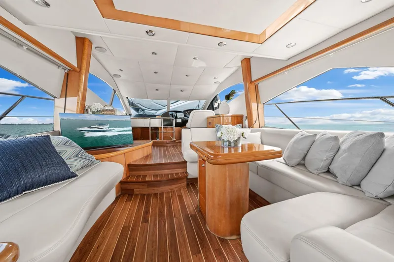  Yacht Photos Pics Luxurious interior of 2006 Sunseeker Manhattan 50 yacht with elegant seating and ocean view.