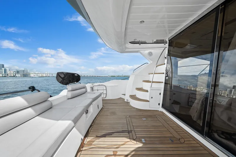  Yacht Photos Pics Luxury Sunseeker Manhattan 50 yacht deck, 2006 model, with city skyline view.