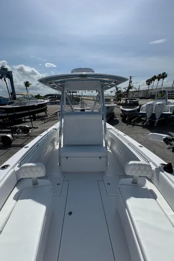  Yacht Photos Pics 2024 Contender 28 Tournament boat with sleek design, spacious deck, and modern features.