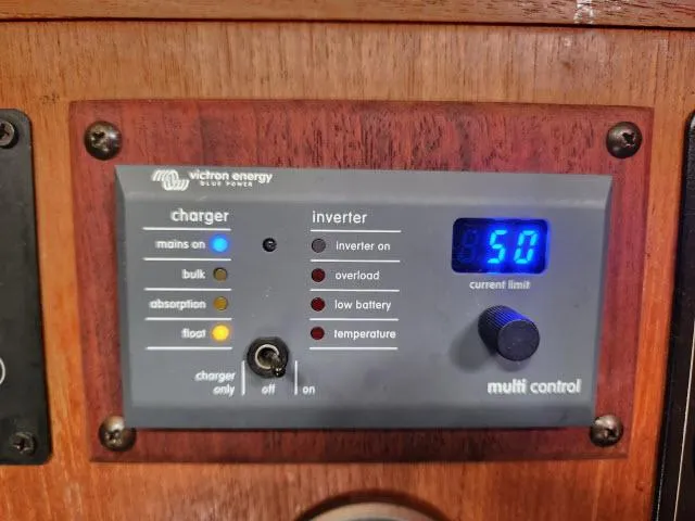 Plan B Yacht Photos Pics Control panel of a 1998 Hunter 450 Passage with Victron Energy charger and inverter settings.