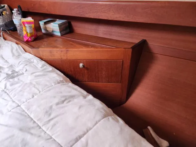 Plan B Yacht Photos Pics Wooden cabin interior with bed and storage, Hunter 450 Passage, 1998 model.