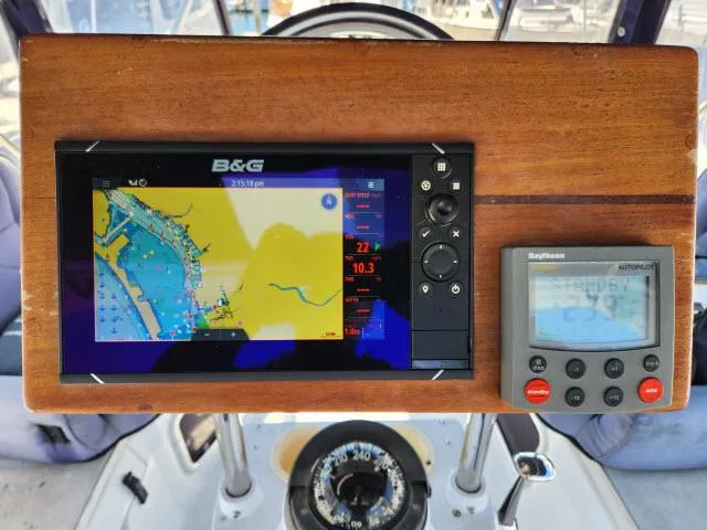 Plan B Yacht Photos Pics Navigation equipment on a 1998 Hunter 450 Passage sailboat, featuring B&G and Raytheon displays.