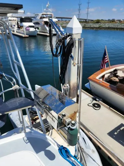 Plan B Yacht Photos Pics Hunter 450 Passage sailboat docked at marina, featuring equipment and American flag, 1998 model.