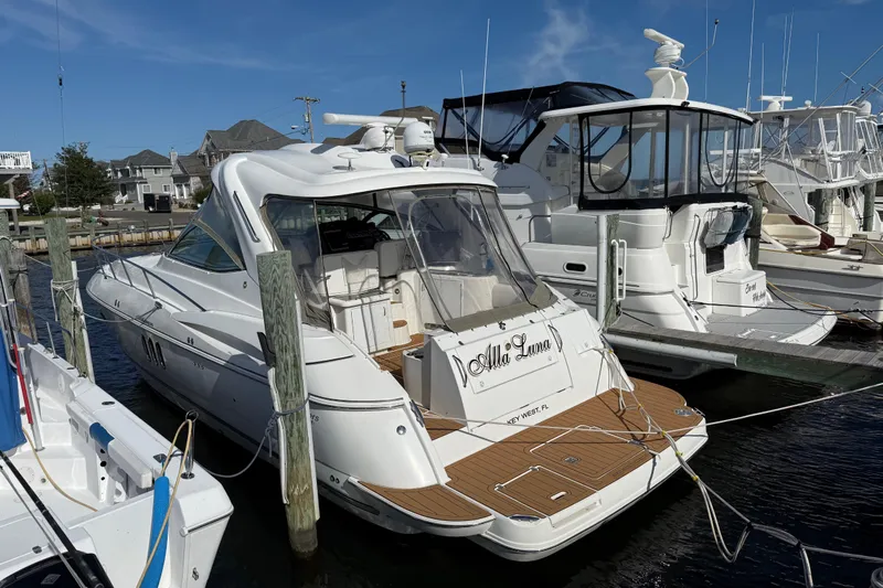  Yacht Photos Pics 2008 Cruisers Yachts 420 Express docked at marina, featuring sleek design and spacious deck.