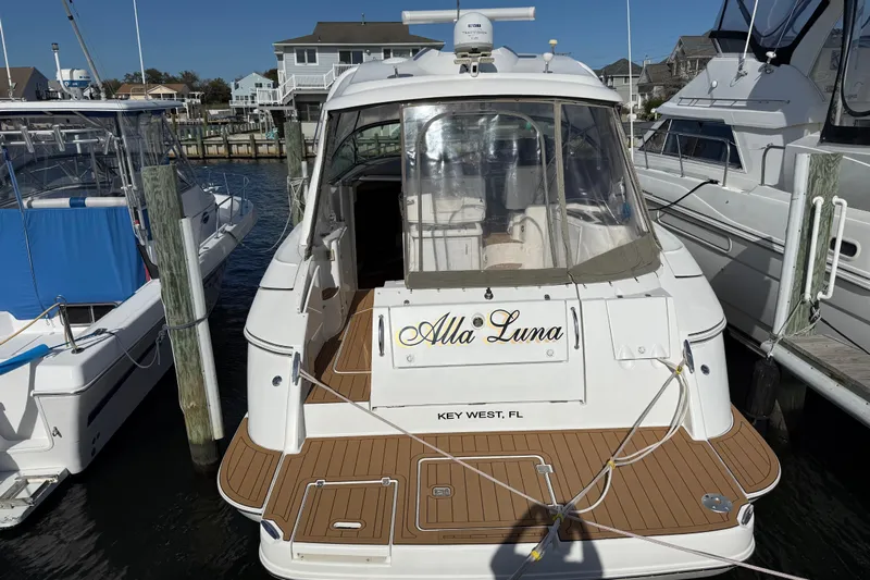  Yacht Photos Pics 2008 Cruisers Yachts 420 Express docked, rear view, with "Alla Luna" name visible.