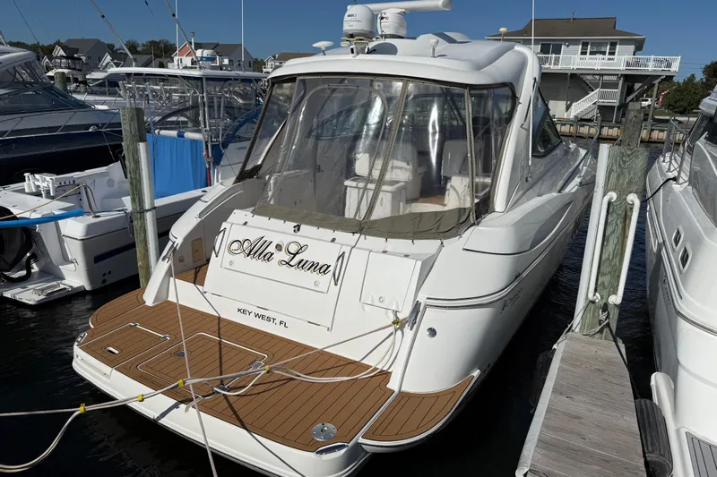  Yacht Photos Pics 2008 Cruisers Yachts 420 Express docked, featuring sleek design and spacious deck.