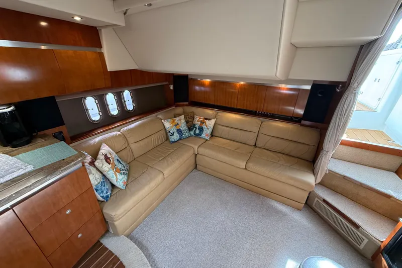  Yacht Photos Pics Luxurious interior of 2008 Cruisers Yachts 420 Express with leather seating and decorative pillows.