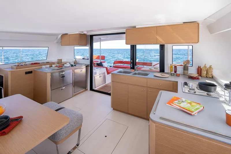  Yacht Photos Pics Manufacturer Provided Image: Modern kitchen interior on 2026 Excess 14 yacht with ocean view.