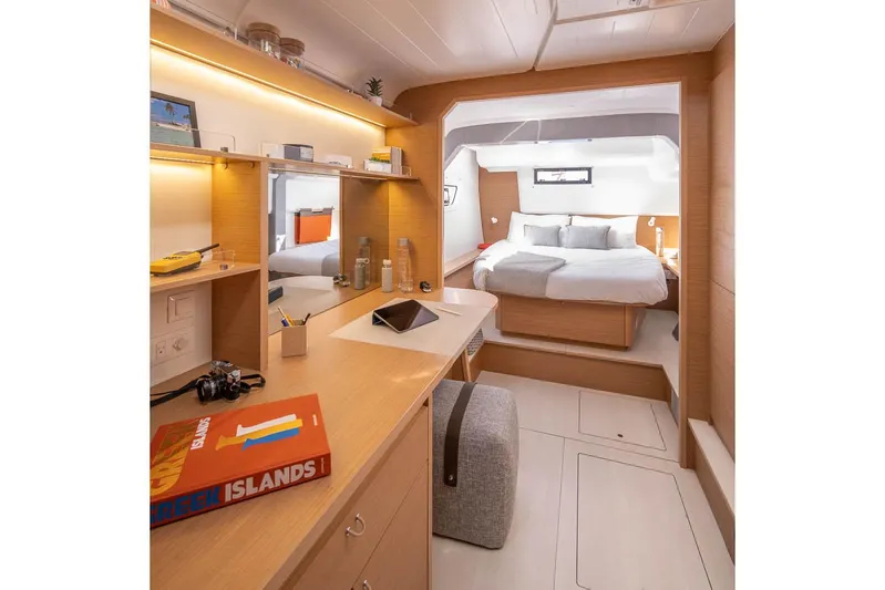  Yacht Photos Pics Manufacturer Provided Image: Luxurious interior of 2026 Excess 14 yacht with modern bedroom and workspace.