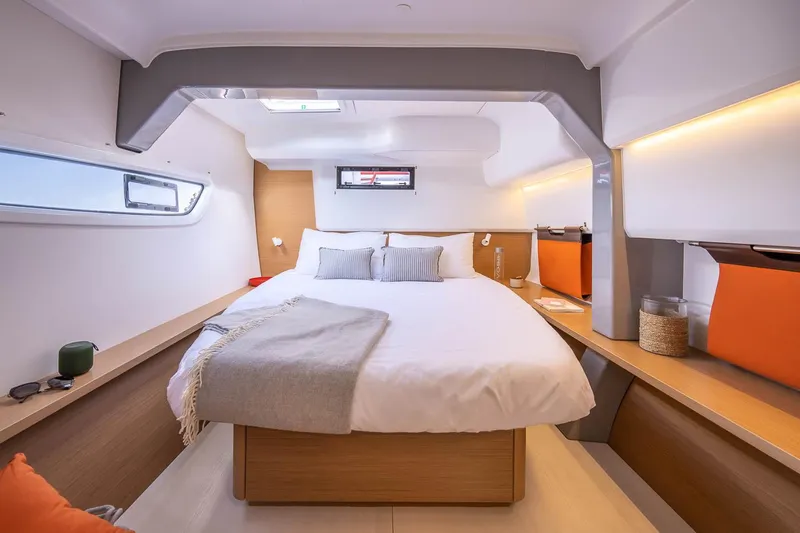  Yacht Photos Pics Manufacturer Provided Image: Luxurious cabin interior of 2026 Excess 14 yacht with cozy bed and modern design.