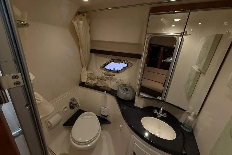 Valubelle Yacht Photos Pics Luxurious bathroom in 2012 Regal 35 Sport Coupe yacht with modern amenities.