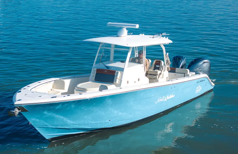 Nauti Builder Yacht Photos Pics 2022 Cobia 350 Center Console boat on clear blue water.