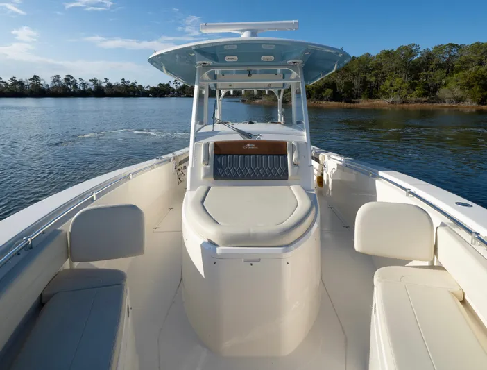Nauti Builder Yacht Photos Pics 2022 Cobia 350 Center Console boat on calm water, featuring spacious seating and sleek design.