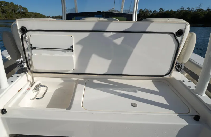 Nauti Builder Yacht Photos Pics 2022 Cobia 350 Center Console boat interior with storage compartment and seating area.