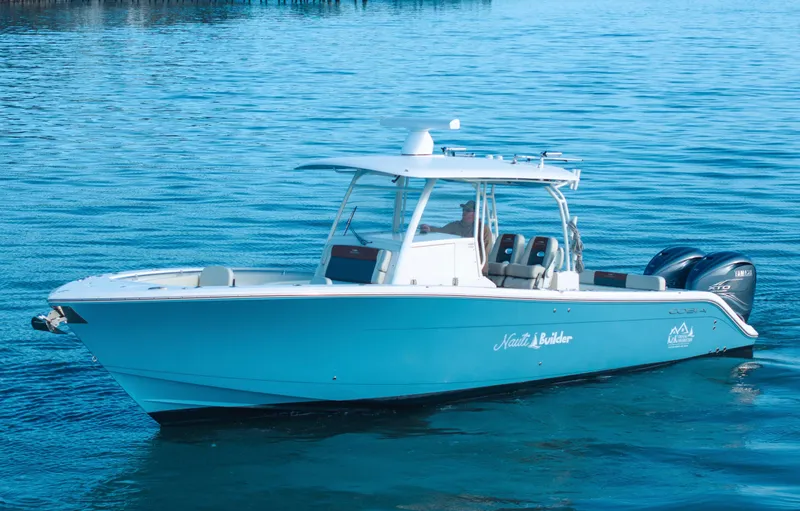 Nauti Builder Yacht Photos Pics 2022 Cobia 350 Center Console boat on calm blue water.