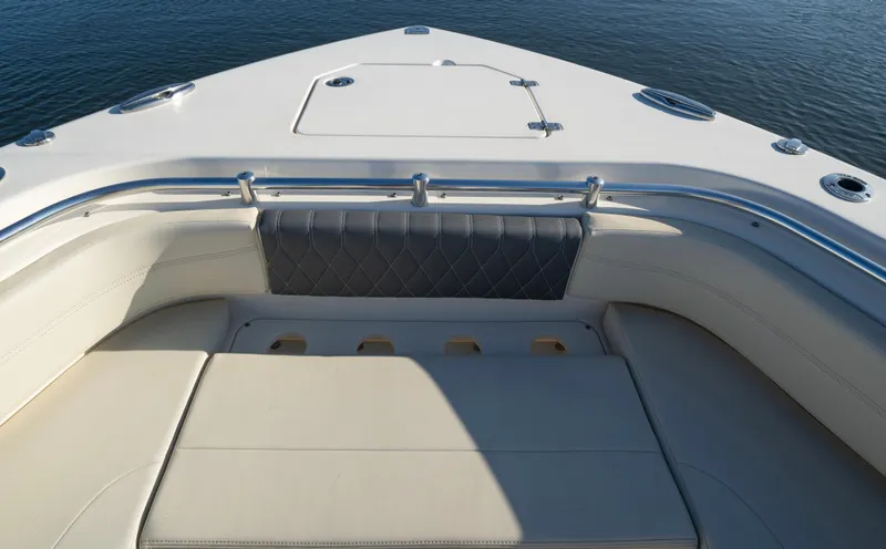 Nauti Builder Yacht Photos Pics 2022 Cobia 350 Center Console boat interior with cushioned seating and stainless steel railings.