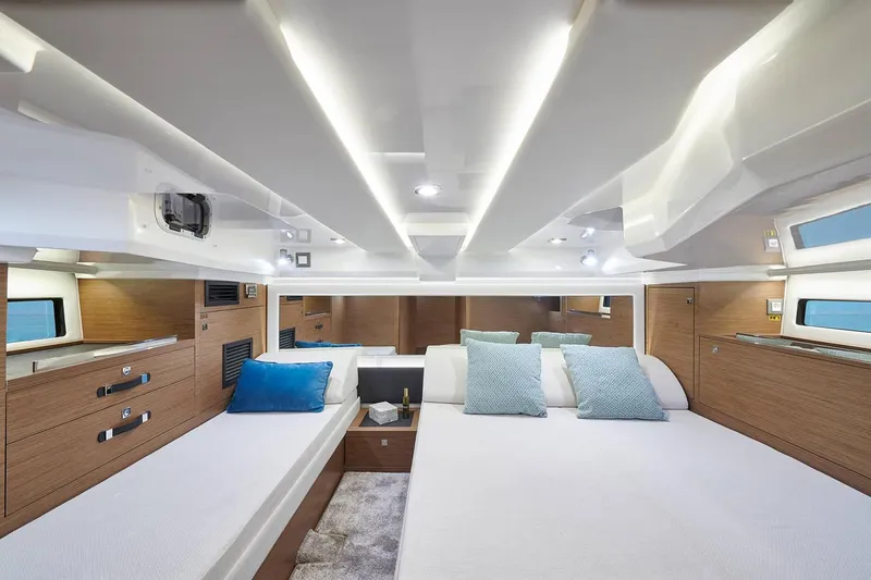  Yacht Photos Pics Manufacturer Provided Image: Luxurious cabin interior of 2022 Jeanneau Leader 12.5 WA with modern design and comfortable bedding.