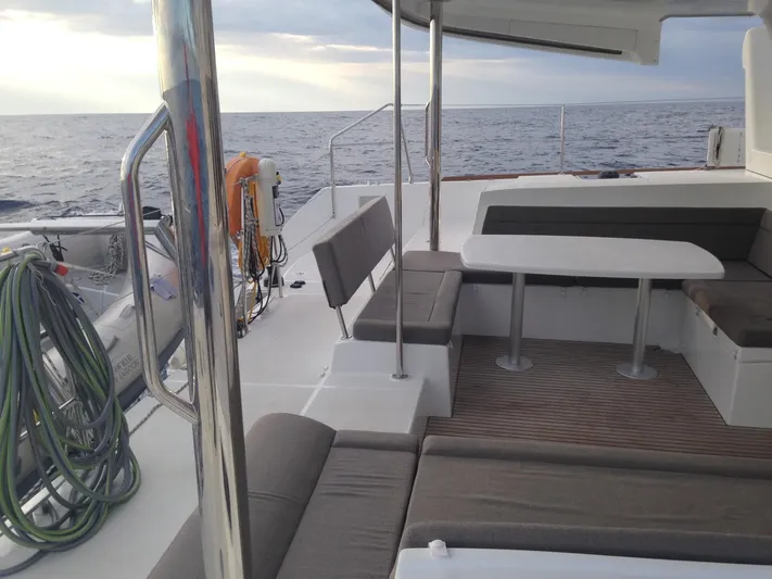  Yacht Photos Pics Lagoon 450 catamaran deck with seating area, ocean view, 2014 model.