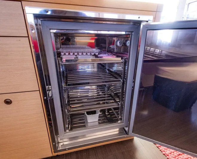  Yacht Photos Pics Open stainless steel refrigerator in 2014 Lagoon 450 yacht kitchen.