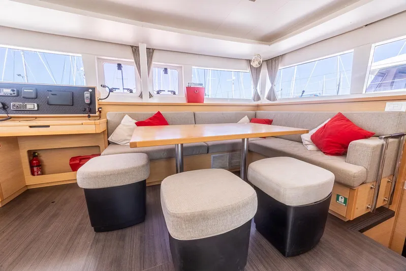  Yacht Photos Pics Interior of 2014 Lagoon 450 catamaran with cozy seating and modern decor.