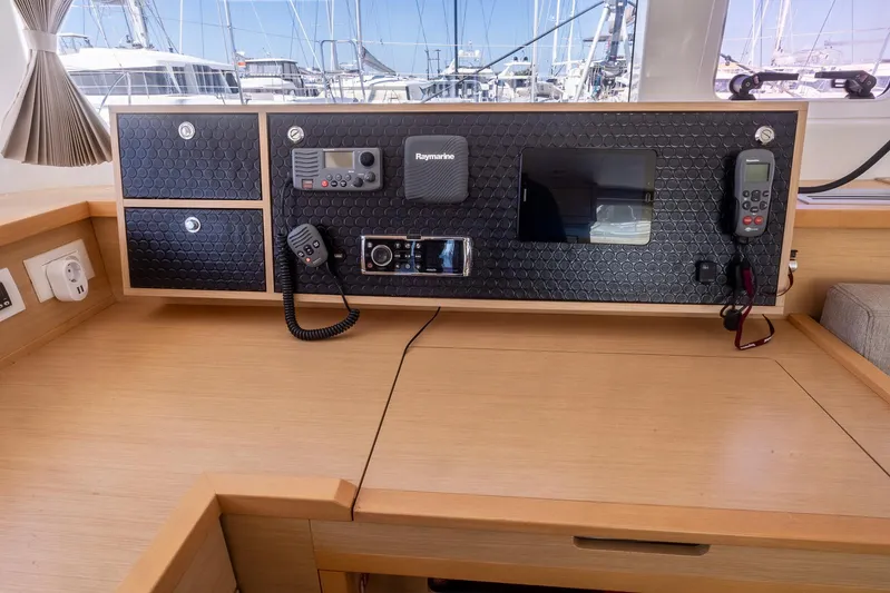  Yacht Photos Pics Control panel of a 2014 Lagoon 450 catamaran with navigation equipment.